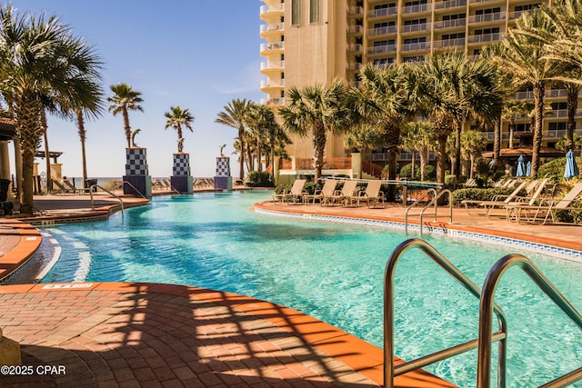 9900 S Thomas Dr Unit 1719, Panama City Beach, FL 32408 - community pool with a patio