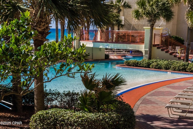 9900 S Thomas Dr Unit 1719, Panama City Beach, FL 32408 - community pool featuring stairway