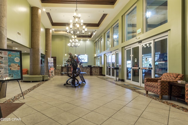 9900 S Thomas Dr Unit 1719, Panama City Beach, FL 32408 - lobby featuring a towering ceiling and ornamental molding