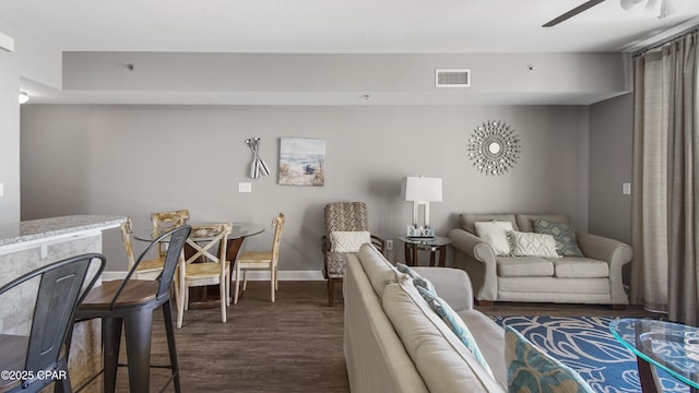 9900 S Thomas Dr Unit 1719, Panama City Beach, FL 32408 - living area featuring dark wood-style flooring and a ceiling fan