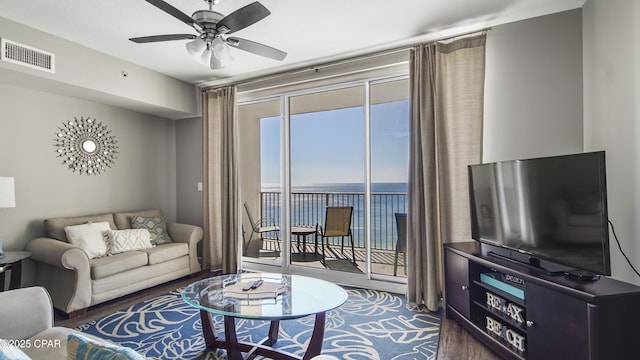 9900 S Thomas Dr Unit 1719, Panama City Beach, FL 32408 - living room with ceiling fan and wood finished floors