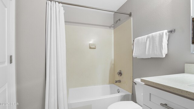 full bathroom with vanity and shower / tub combo