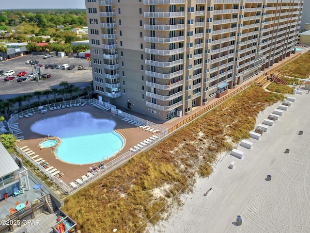 view of apartment building / complex with a community pool