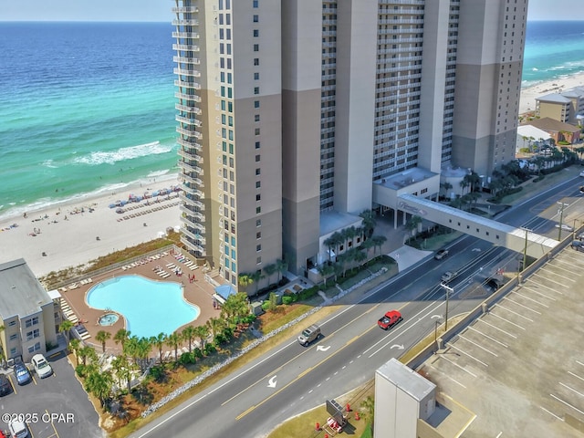 bird's eye view of extended coastline and a pool