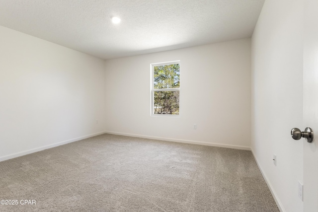 4060 Parkton Ct, Chipley, FL 32428 - carpeted spare room featuring baseboards and a textured ceiling