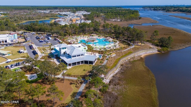 drone / aerial view with a water view