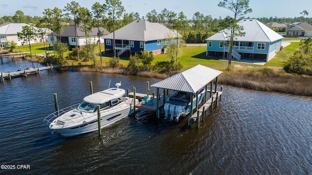 365 Confidence Way, Panama City, FL 32409 - dock featuring boat lift, a water view, and stairway