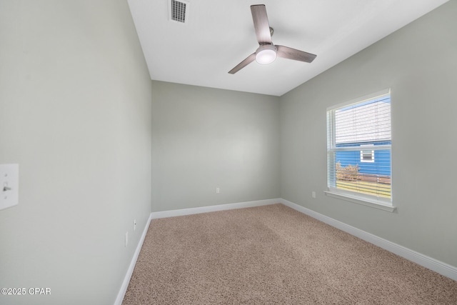 365 Confidence Way, Panama City, FL 32409 - spare room featuring carpet, baseboards, and ceiling fan
