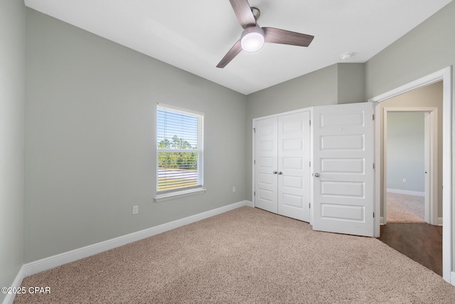 365 Confidence Way, Panama City, FL 32409 - unfurnished bedroom with carpet, a closet, baseboards, and ceiling fan