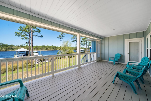 365 Confidence Way, Panama City, FL 32409 - wooden deck featuring a water view, a boat dock, and boat lift