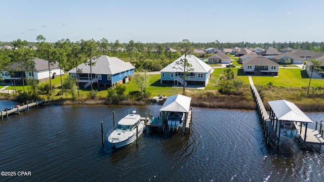 365 Confidence Way, Panama City, FL 32409 - dock area with boat lift, a water view, and a residential view