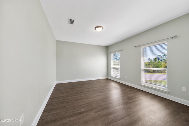 365 Confidence Way, Panama City, FL 32409 - spare room with dark wood finished floors and baseboards