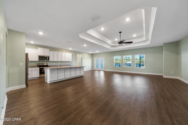 365 Confidence Way, Panama City, FL 32409 - unfurnished living room with a ceiling fan, dark wood finished floors, recessed lighting, a sink, and baseboards