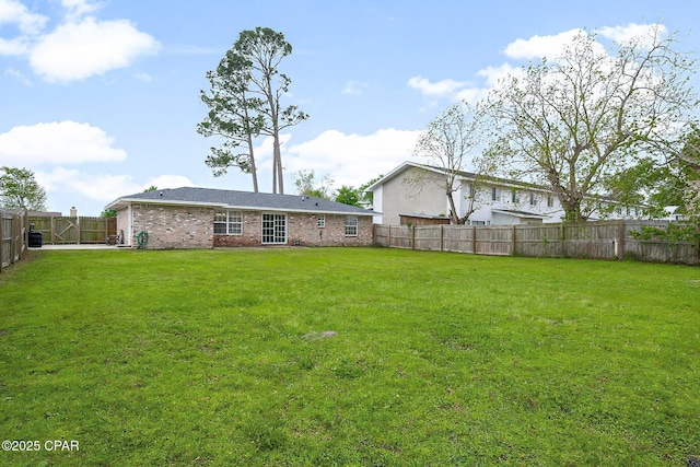 view of yard featuring a fenced backyard