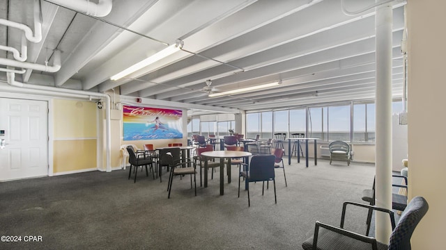dining space featuring carpet floors