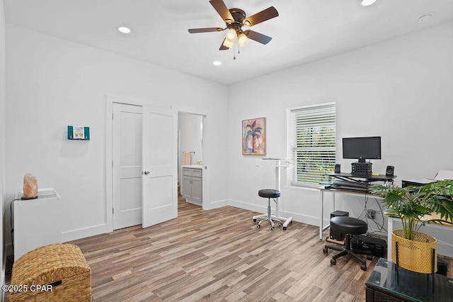home office with light wood-style flooring, baseboards, a ceiling fan, and recessed lighting
