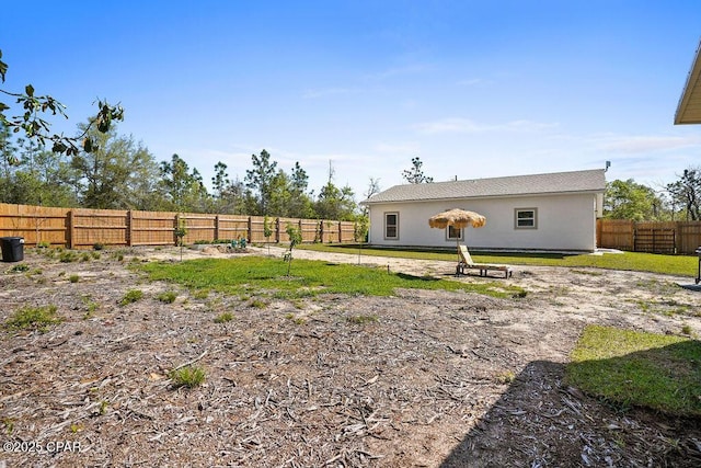 view of yard featuring a fenced backyard