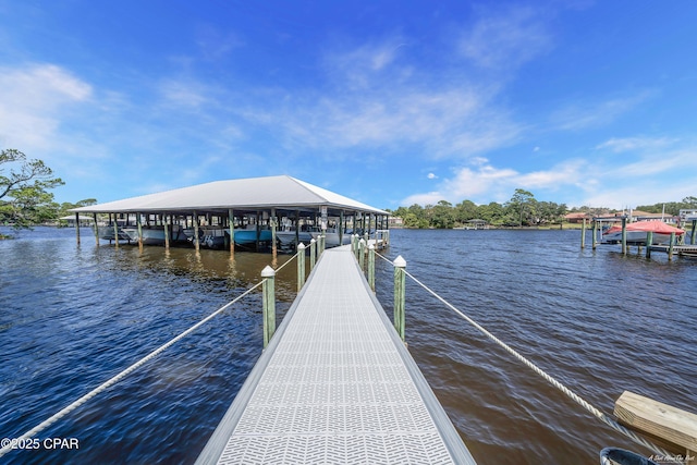 dock area featuring a water view and boat lift