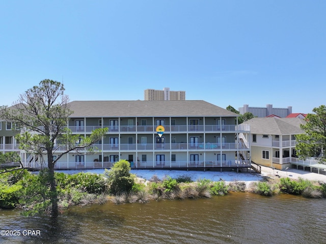 view of property with a water view