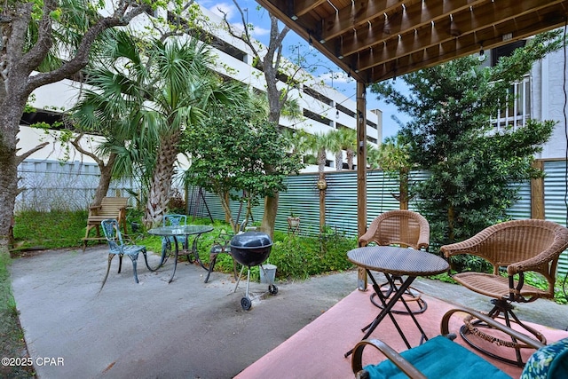 640 W Caladium Cir Unit A, Panama City Beach, FL 32413 - view of patio / terrace with a fenced backyard and area for grilling