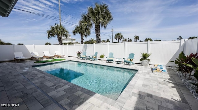244 Sands St, Panama City Beach, FL 32413 - view of swimming pool with a patio and a fenced backyard