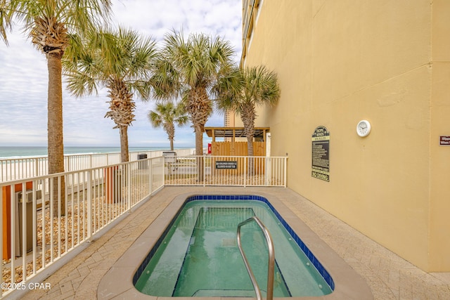 17643 Front Beach Rd Unit 1805, Panama City Beach, FL 32413 - view of swimming pool with view of water and beach and a swimming pool