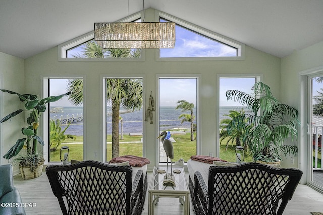 7124 Leeward St, Port St Joe, FL 32456 - sunroom with lofted ceiling and a water view