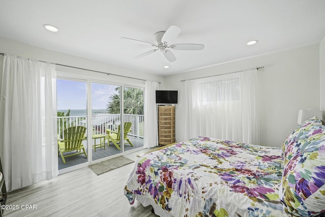 7124 Leeward St, Port St Joe, FL 32456 - bedroom featuring access to exterior, wood finished floors, recessed lighting, and a ceiling fan
