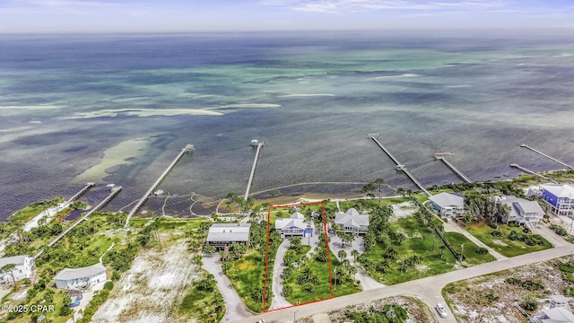 7124 Leeward St, Port St Joe, FL 32456 - aerial view of property and surrounding area featuring a large body of water and property parcel outlined