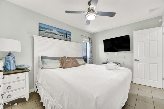 bedroom featuring ceiling fan and light tile patterned floors