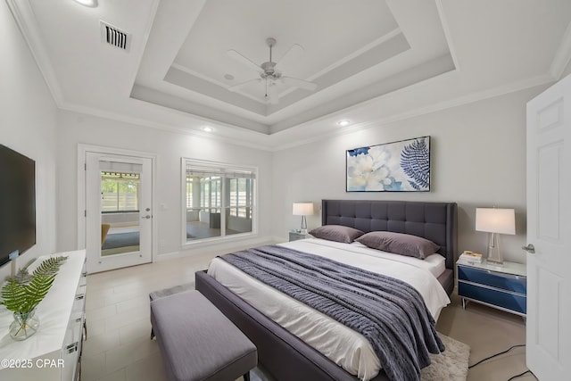 2015 Tupelo Ct, Panama City, FL 32405 - bedroom featuring visible vents, access to outside, a ceiling fan, and a raised ceiling