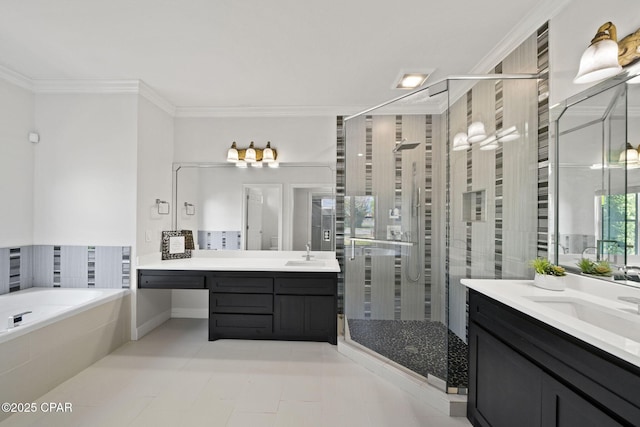 2015 Tupelo Ct, Panama City, FL 32405 - full bath with a bath, a sink, crown molding, a shower stall, and two vanities