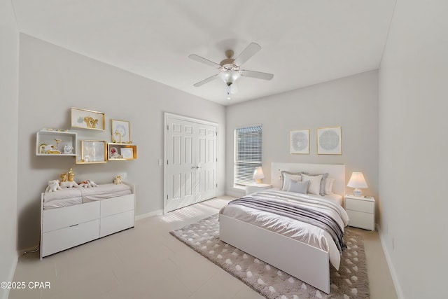 2015 Tupelo Ct, Panama City, FL 32405 - bedroom featuring a closet, ceiling fan, and baseboards