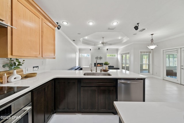 2015 Tupelo Ct, Panama City, FL 32405 - kitchen featuring visible vents, a sink, a wealth of natural light, a peninsula, and stainless steel appliances