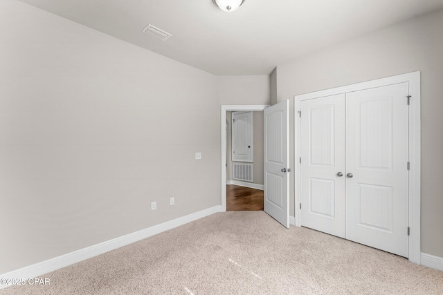 31 Viper Rd, Santa Rosa Beach, FL 32459 - unfurnished bedroom featuring visible vents, baseboards, a closet, and carpet