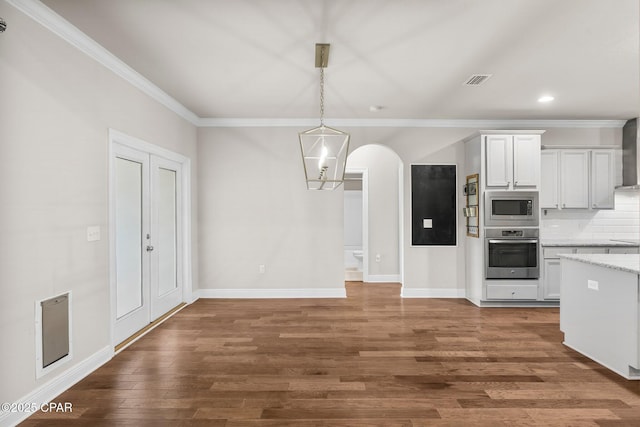 31 Viper Rd, Santa Rosa Beach, FL 32459 - kitchen with dark wood-style flooring, baseboards, crown molding, visible vents, and appliances with stainless steel finishes