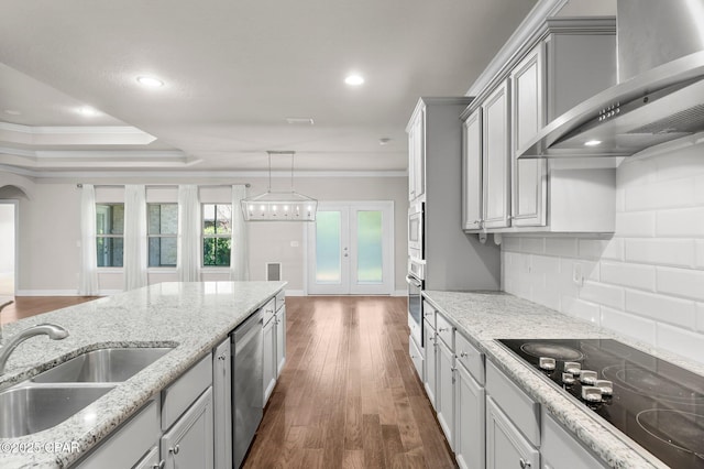 31 Viper Rd, Santa Rosa Beach, FL 32459 - kitchen featuring backsplash, wall chimney exhaust hood, a sink, stainless steel appliances, and dark wood-style floors