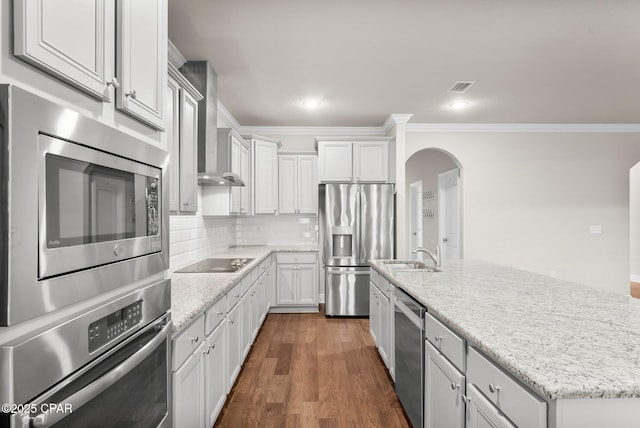 31 Viper Rd, Santa Rosa Beach, FL 32459 - kitchen with stainless steel appliances, a sink, wall chimney exhaust hood, and crown molding