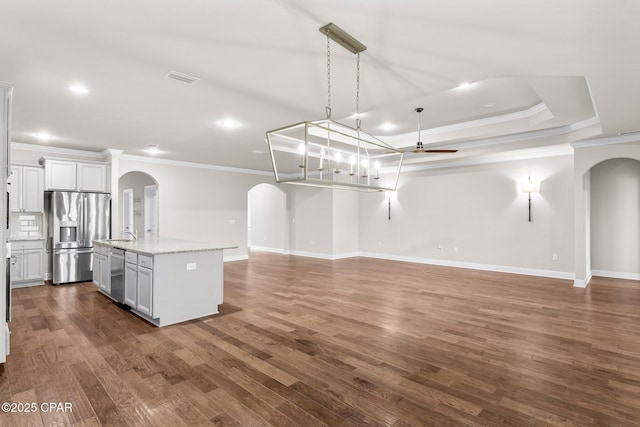 31 Viper Rd, Santa Rosa Beach, FL 32459 - kitchen with stainless steel appliances, arched walkways, ornamental molding, and a ceiling fan