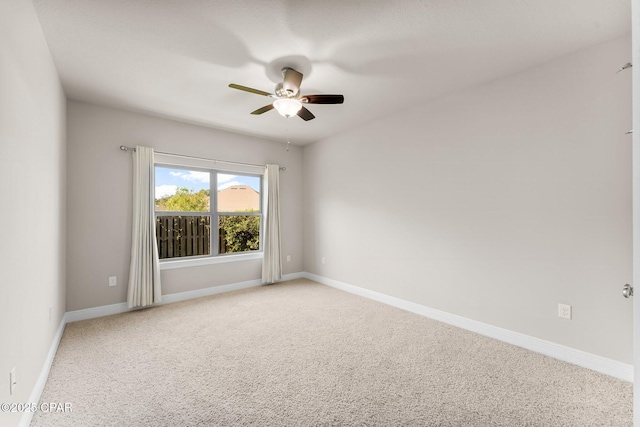 31 Viper Rd, Santa Rosa Beach, FL 32459 - unfurnished room featuring light carpet, baseboards, and ceiling fan