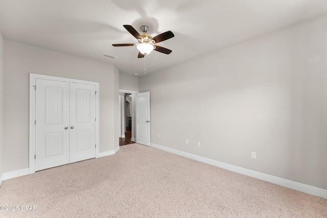 31 Viper Rd, Santa Rosa Beach, FL 32459 - unfurnished bedroom featuring a closet, baseboards, a ceiling fan, visible vents, and carpet