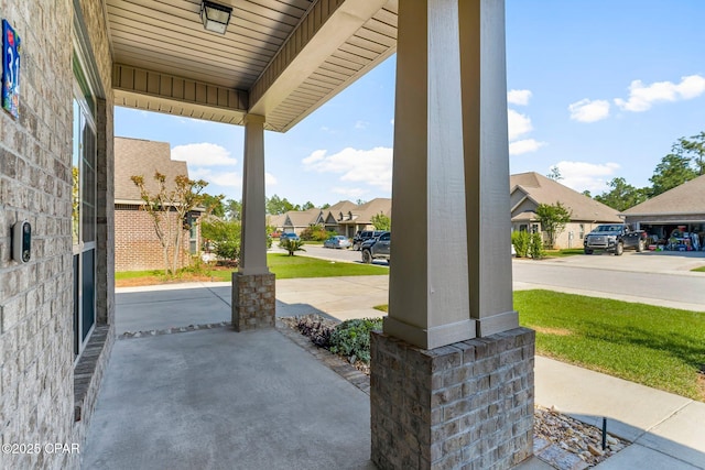 31 Viper Rd, Santa Rosa Beach, FL 32459 - view of patio featuring covered porch and a residential view