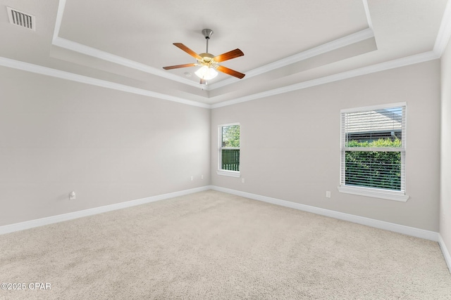 31 Viper Rd, Santa Rosa Beach, FL 32459 - spare room featuring ceiling fan, a tray ceiling, light colored carpet, visible vents, and baseboards