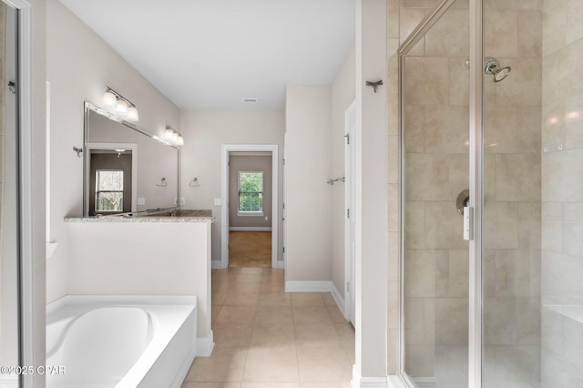 31 Viper Rd, Santa Rosa Beach, FL 32459 - full bath featuring a bath, baseboards, a shower stall, vanity, and tile patterned floors
