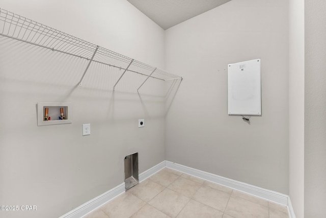 31 Viper Rd, Santa Rosa Beach, FL 32459 - laundry room with electric dryer hookup, baseboards, light tile patterned floors, washer hookup, and laundry area
