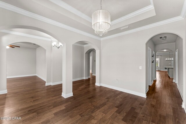 31 Viper Rd, Santa Rosa Beach, FL 32459 - unfurnished dining area featuring a notable chandelier, baseboards, dark wood finished floors, visible vents, and a raised ceiling