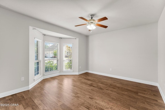 31 Viper Rd, Santa Rosa Beach, FL 32459 - spare room featuring wood finished floors, baseboards, and a ceiling fan