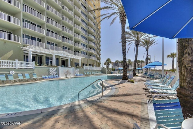 community pool with a patio