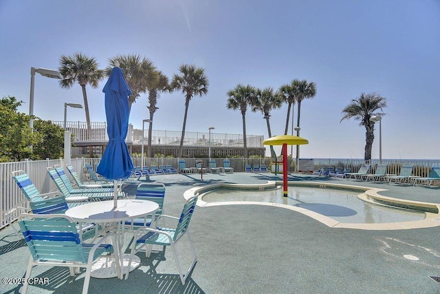 view of home's community featuring a patio, fence, and a pool