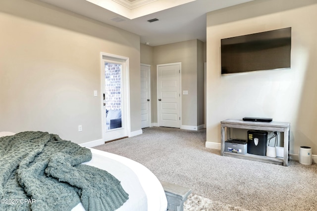 carpeted bedroom featuring baseboards, visible vents, and access to exterior